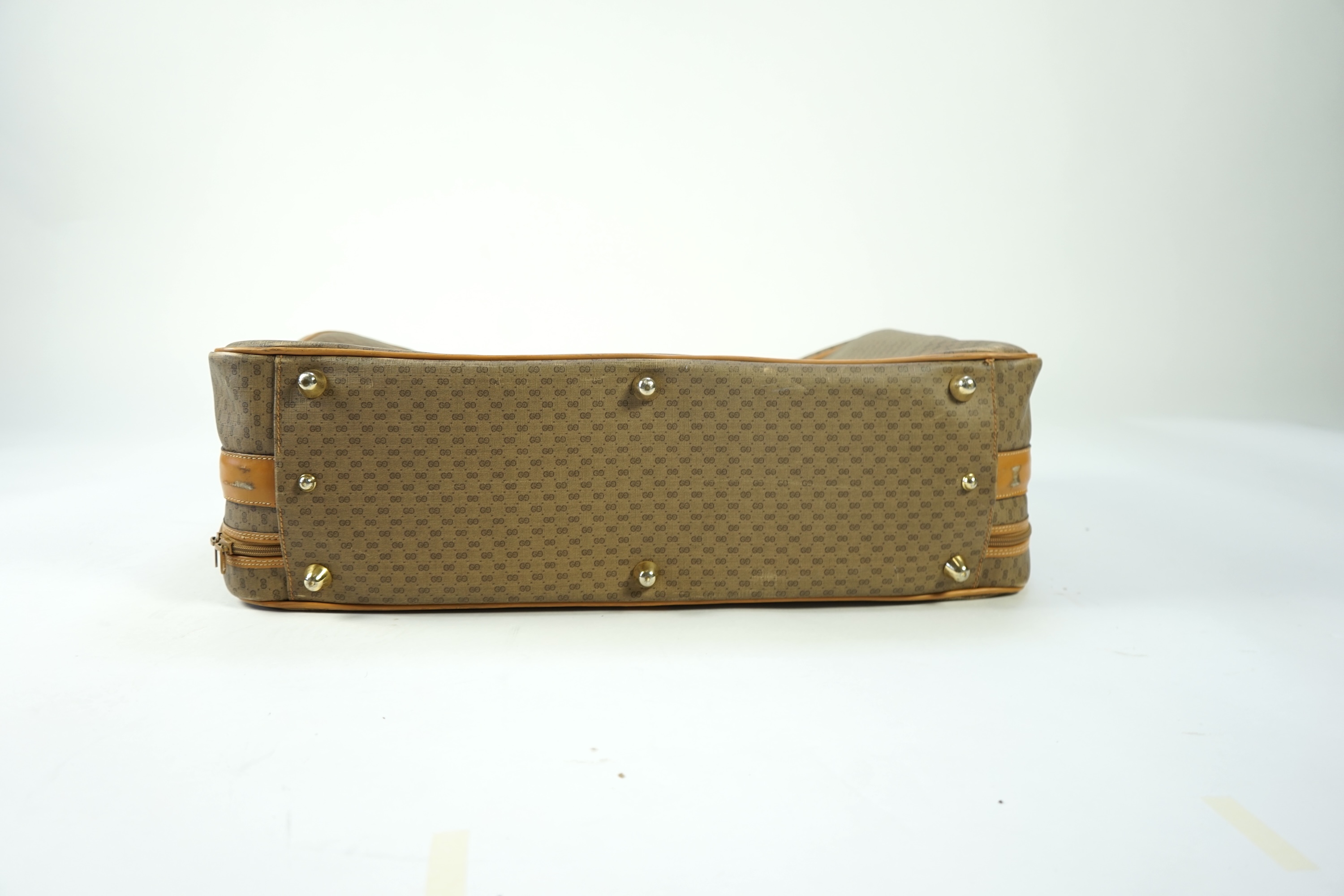 A vintage Gucci micro GG monogram canvas suitcase